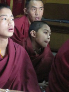 monks listening to rinpoche teac